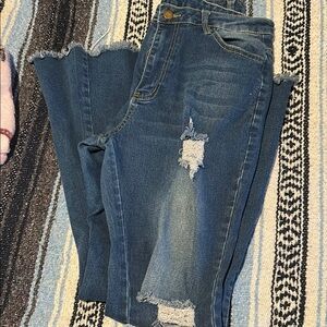 Distressed bell bottoms size L